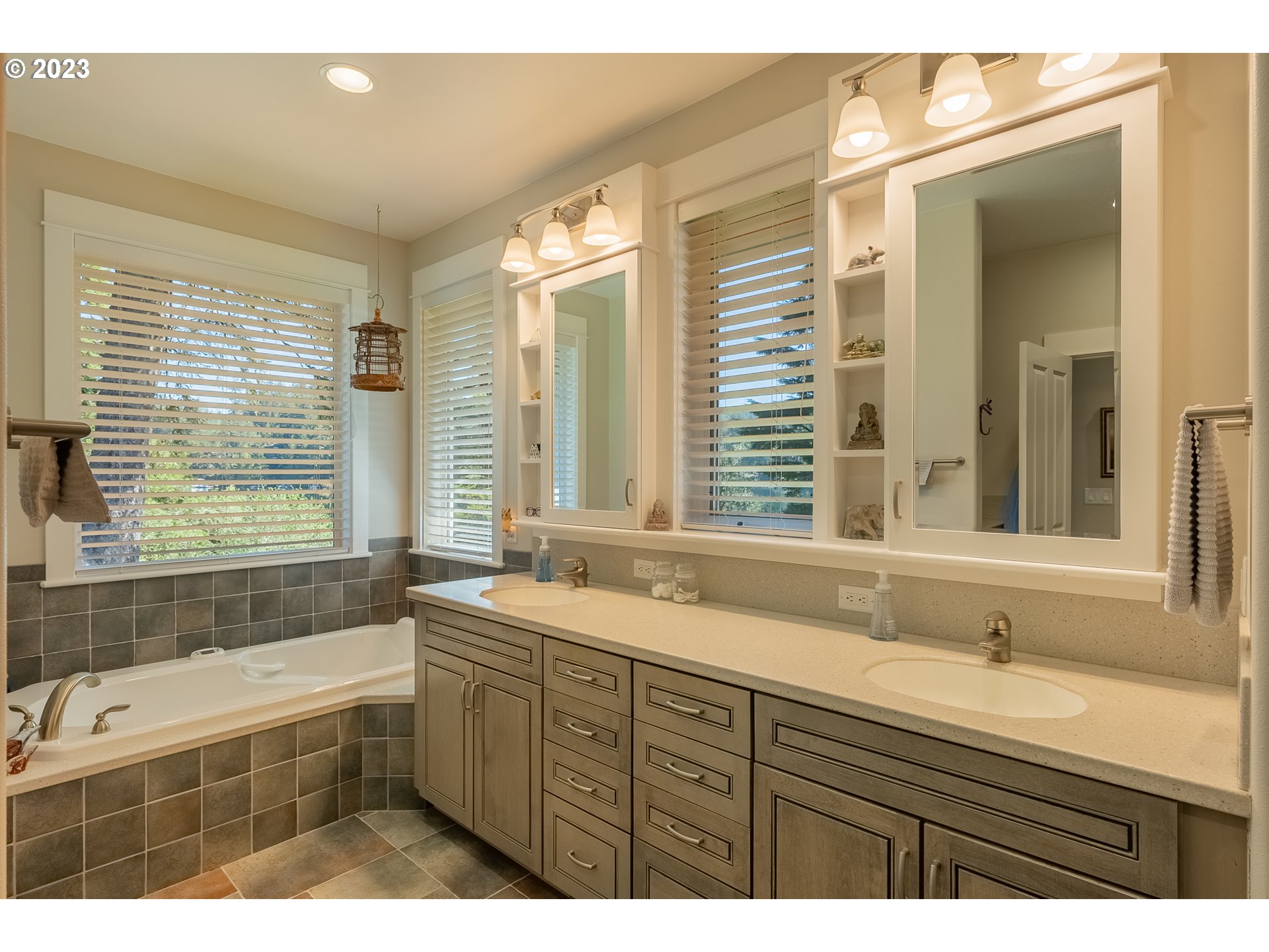 83917 Cloud 9 Road Florence, OR 97439 - Photo 25 of 48 a bathroom with a granite countertop sink mirror bathtub and double