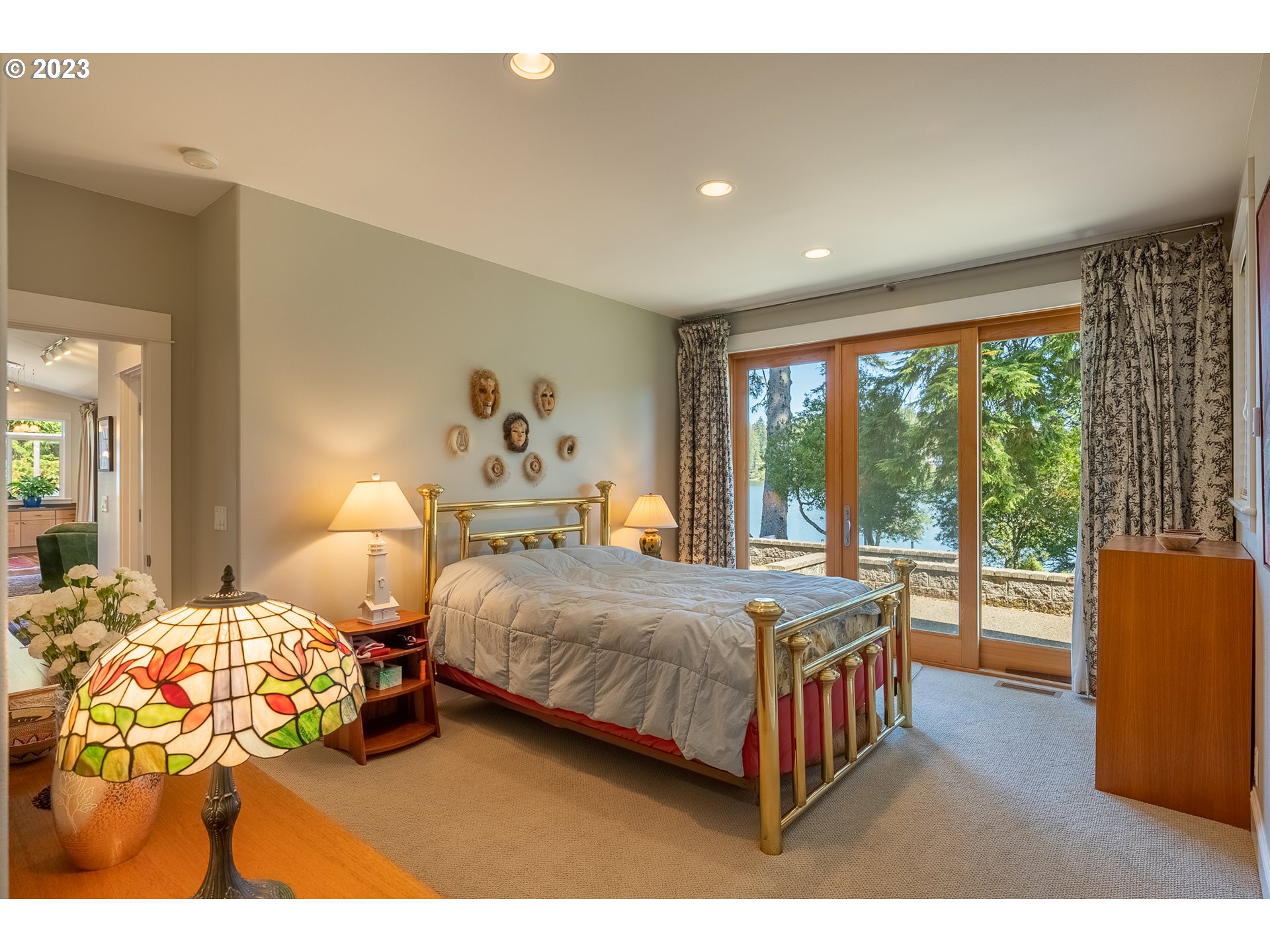 83917 Cloud 9 Road Florence, OR 97439 - Photo 28 of 48 a bedroom with a bed and a large window