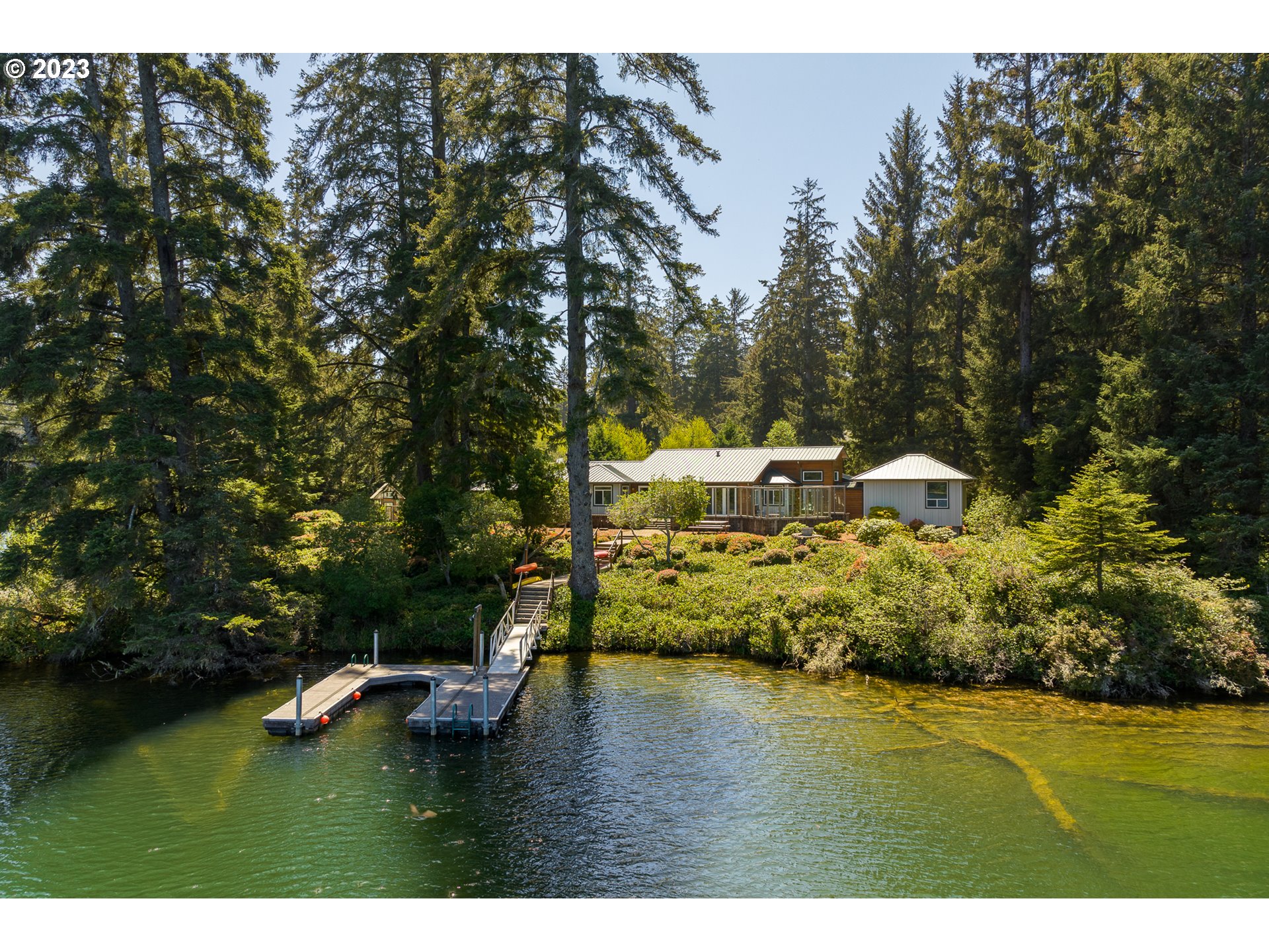 83917 Cloud 9 Road Florence, OR 97439 - Photo 46 of 48 a view of a lake with houses