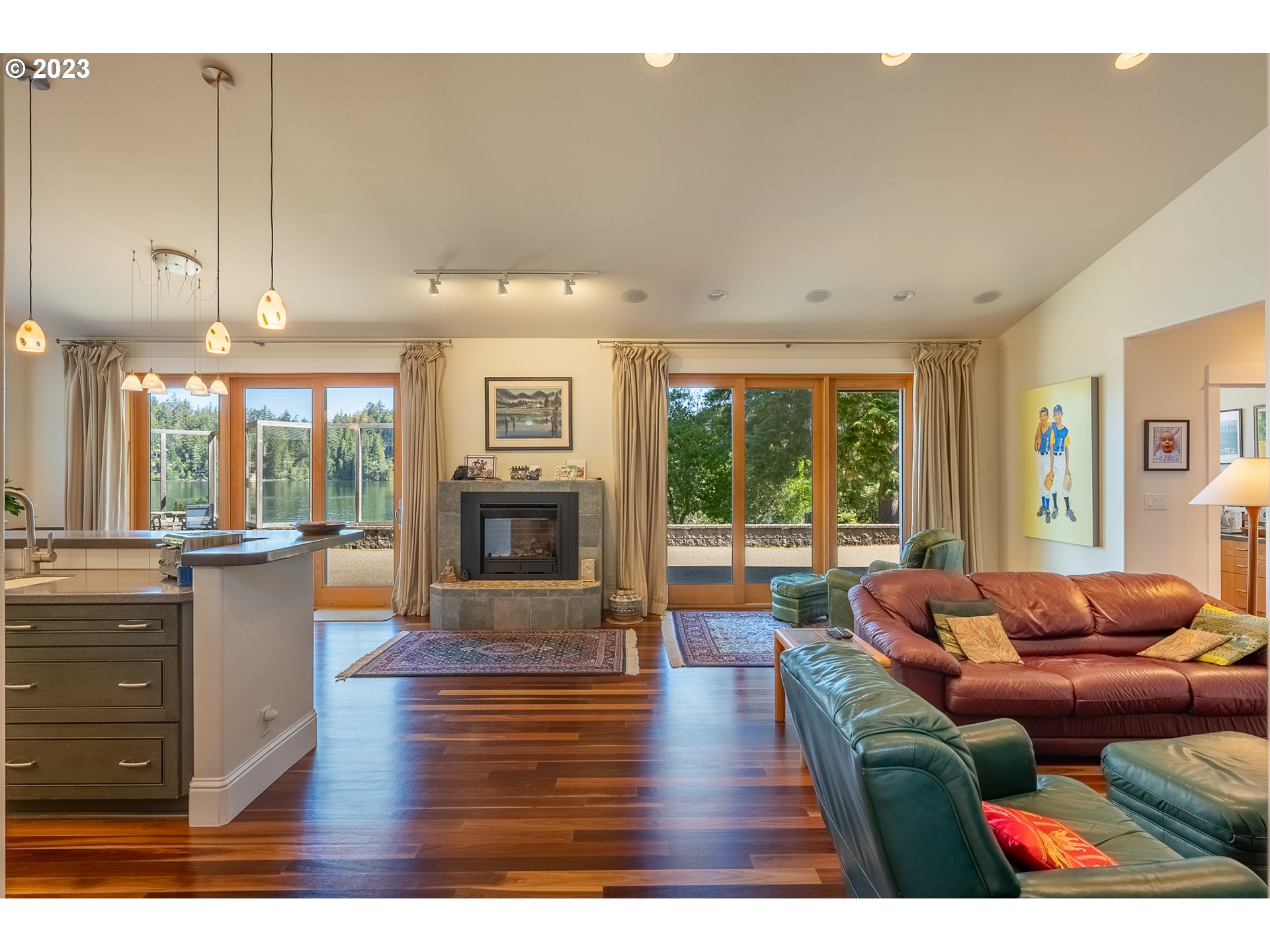 83917 Cloud 9 Road Florence, OR 97439 - Photo 8 of 48 a living room with furniture large window and a fireplace