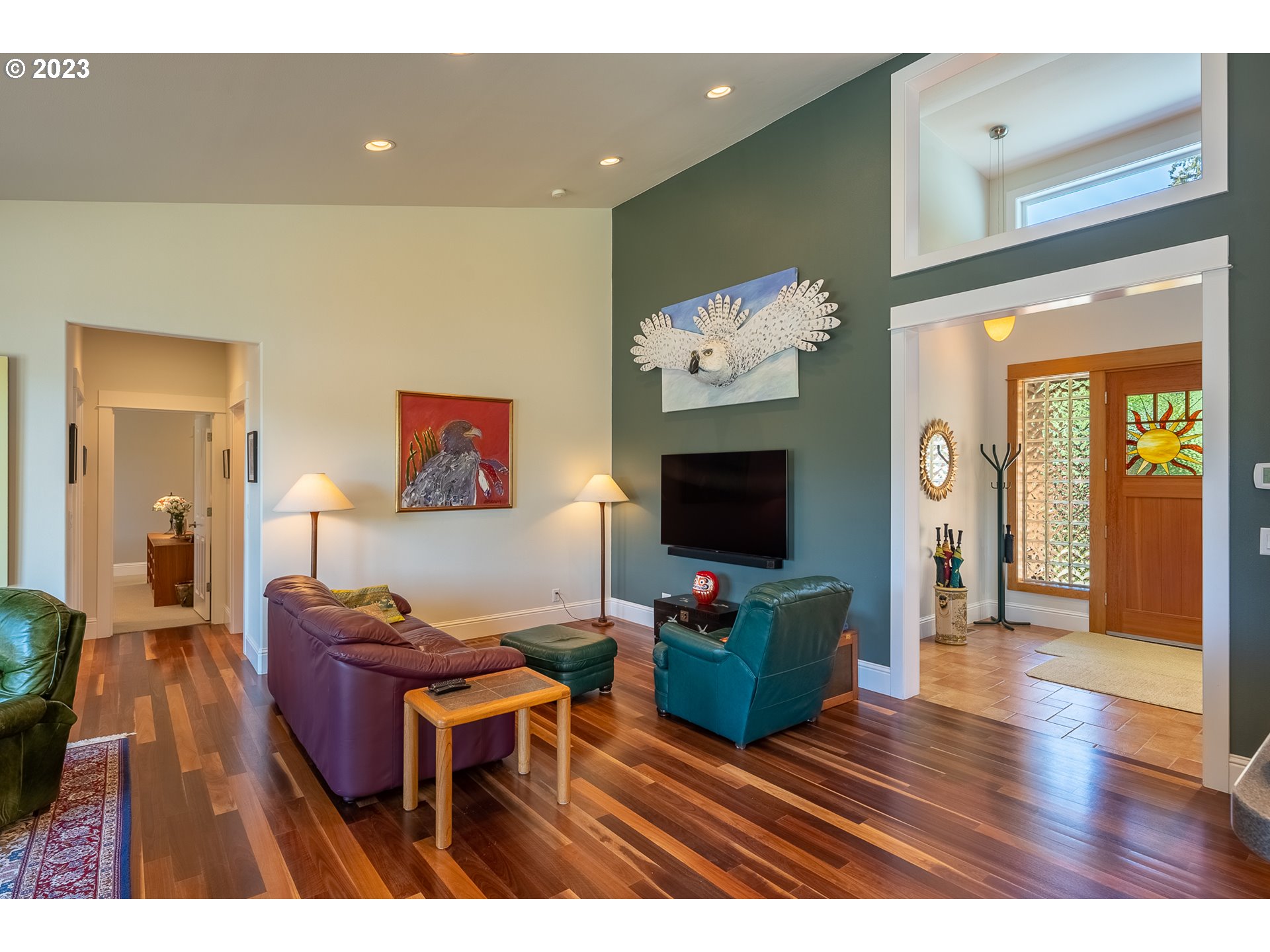 83917 Cloud 9 Road Florence, OR 97439 - Photo 9 of 48 a living room with furniture a flat screen tv and a fireplace