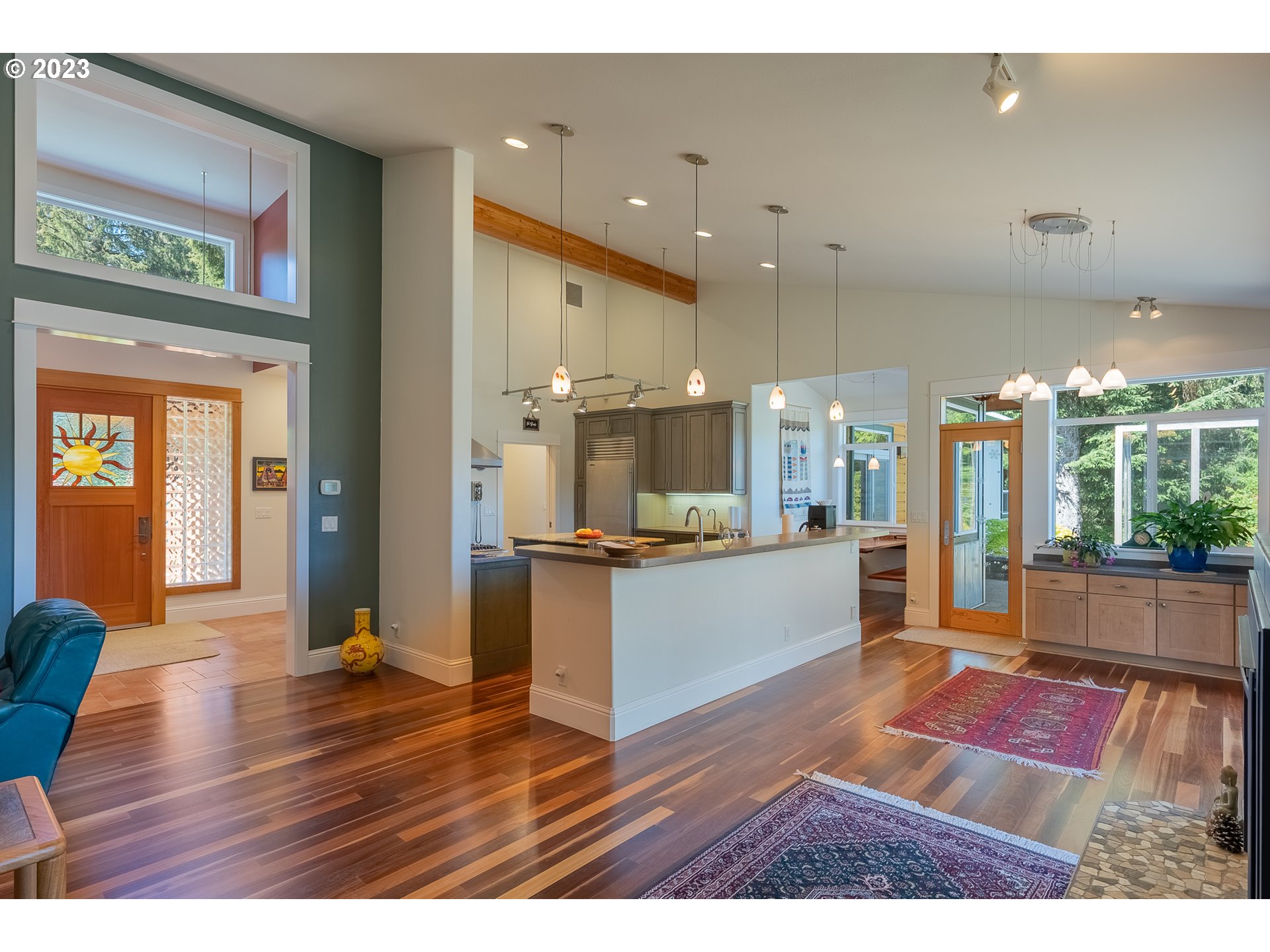 83917 Cloud 9 Road Florence, OR 97439 - Photo 10 of 48 a open kitchen with stainless steel appliances granite countertop a refrigerator a sink and a wooden cabinets