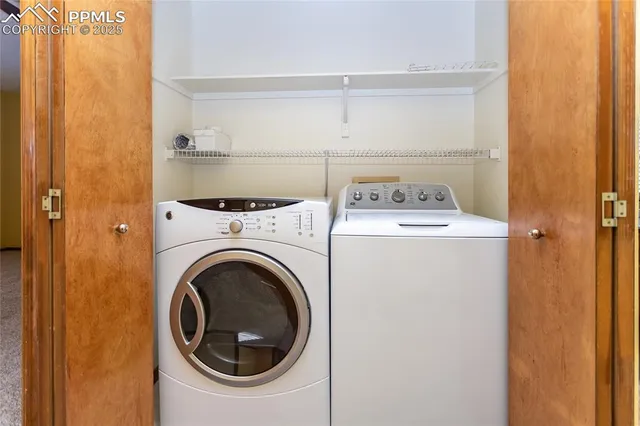a utility room with dryer and washer