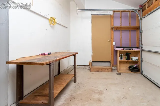 a view of a deck with wooden floor and fence