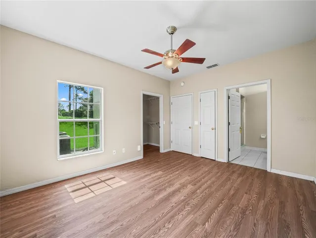 a view of an empty walk in closet