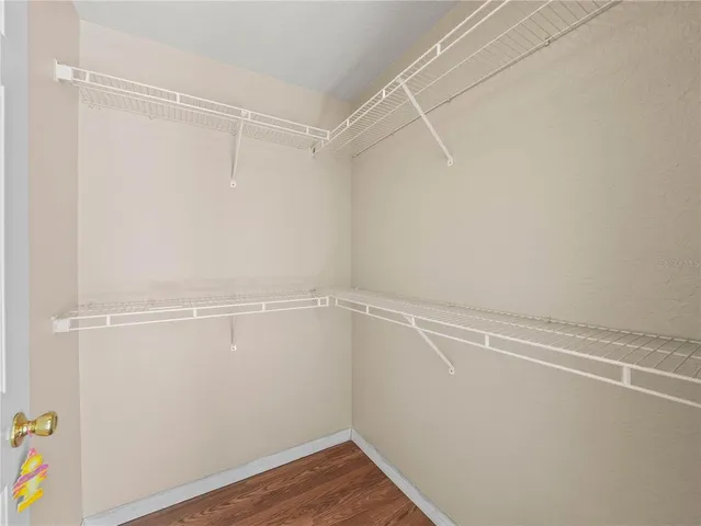 a view of a room with racks on the wall