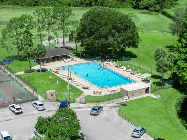 a view of a city and green space