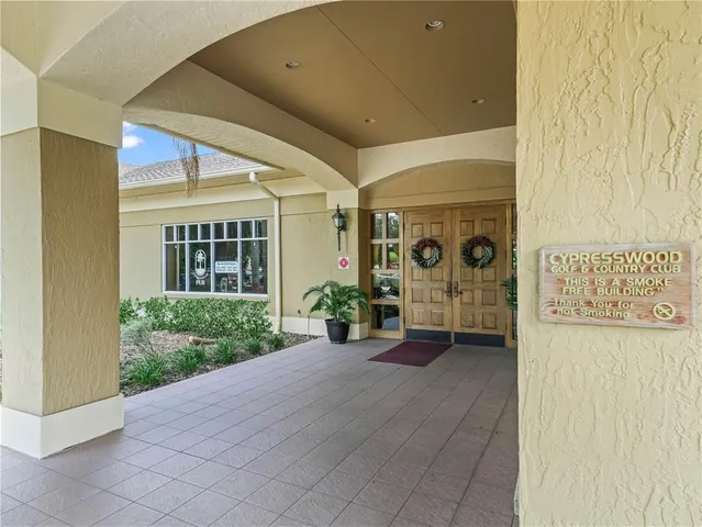 a view of a lake with a yard