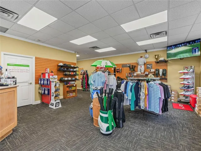 a view of back yard of the house with outdoor seating