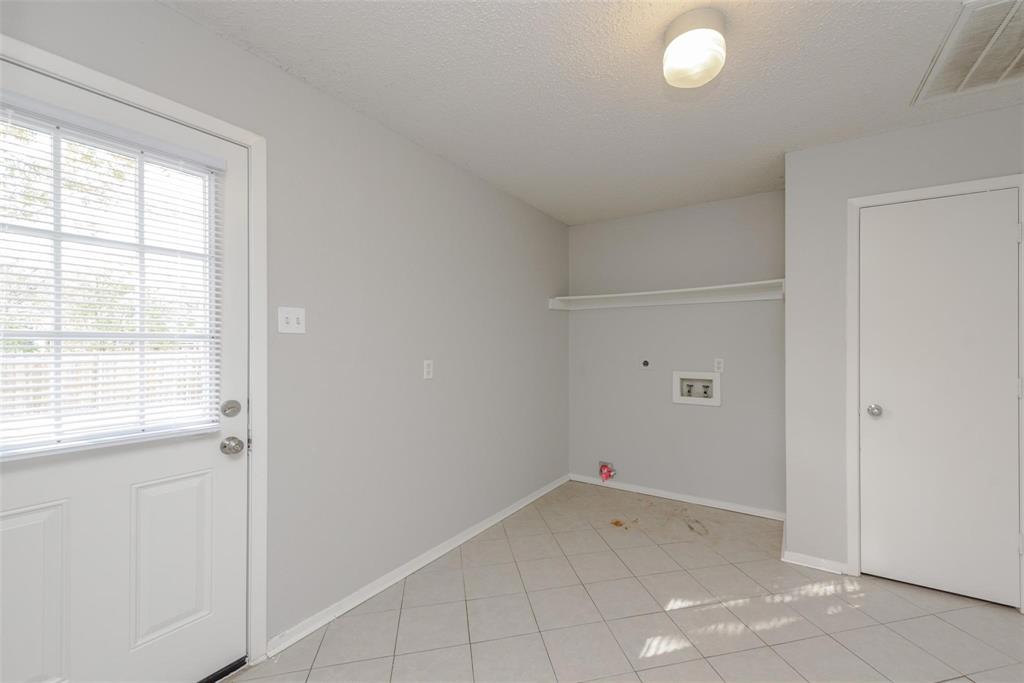 3609 Cooper Branch East Denton, TX 76209 - Photo 16 of 23 wooden floor in an empty room with a window