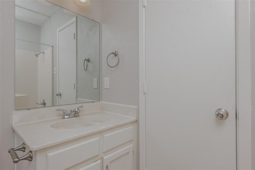 3609 Cooper Branch East Denton, TX 76209 - Photo 18 of 23 a bathroom with a sink and a mirror