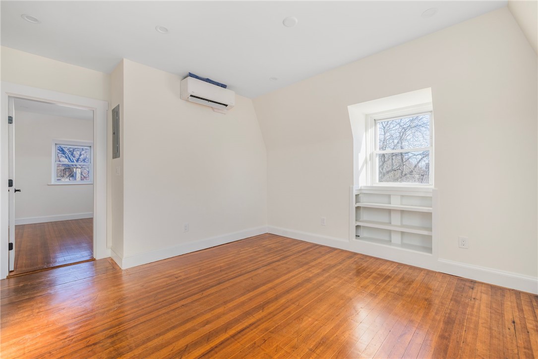 67 Perry Street, Unit 7 Newport, RI 02840 - Photo 12 of 27 Living area showing the bedroom door access.