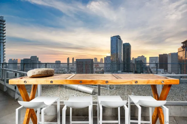 a view of a swimming pool with a roof deck