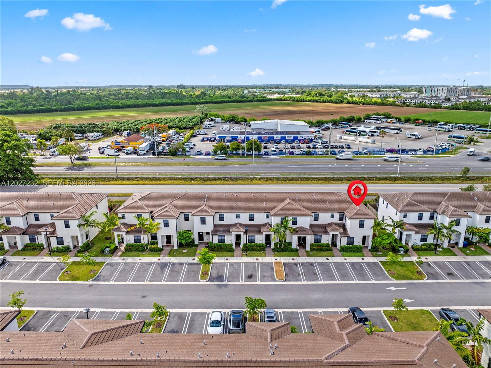 23489 Southwest 127th Place Homestead, FL 33032 - Photo 23 of 24 an aerial view of a city
