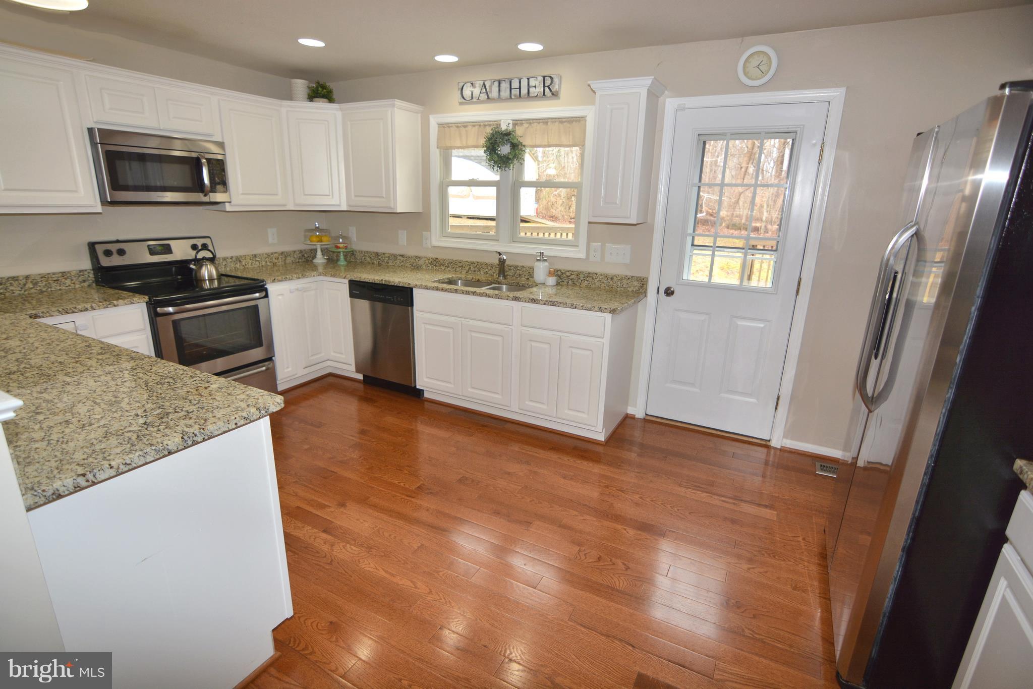 1320 Wilson Road Huntingtown, MD 20639 - Photo 10 of 29 High end! Beautiful countertops and cabinetry!
