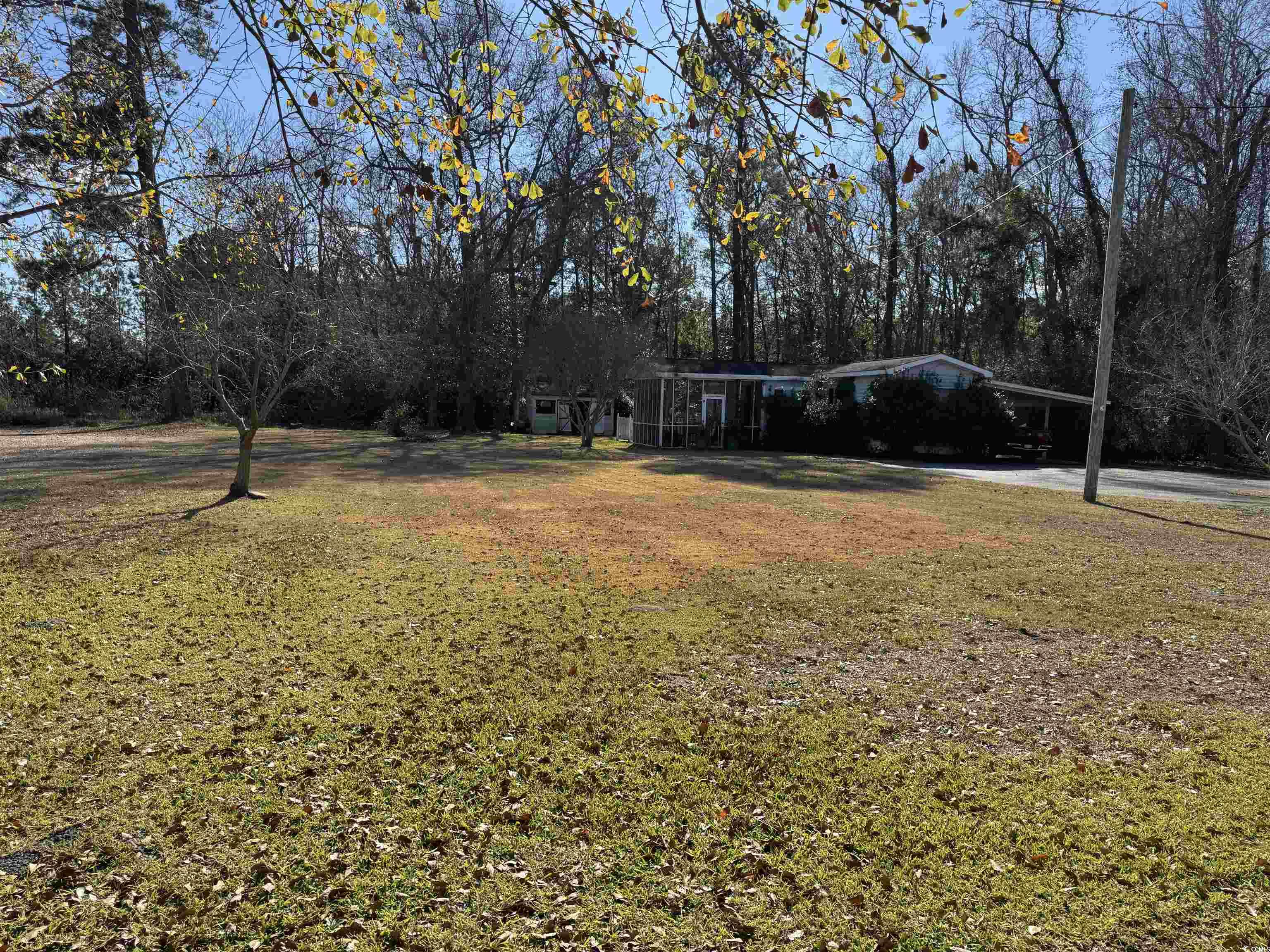 1014 Holt Road Conway, SC 29526 - Photo 20 of 23 View of yard featuring a carport