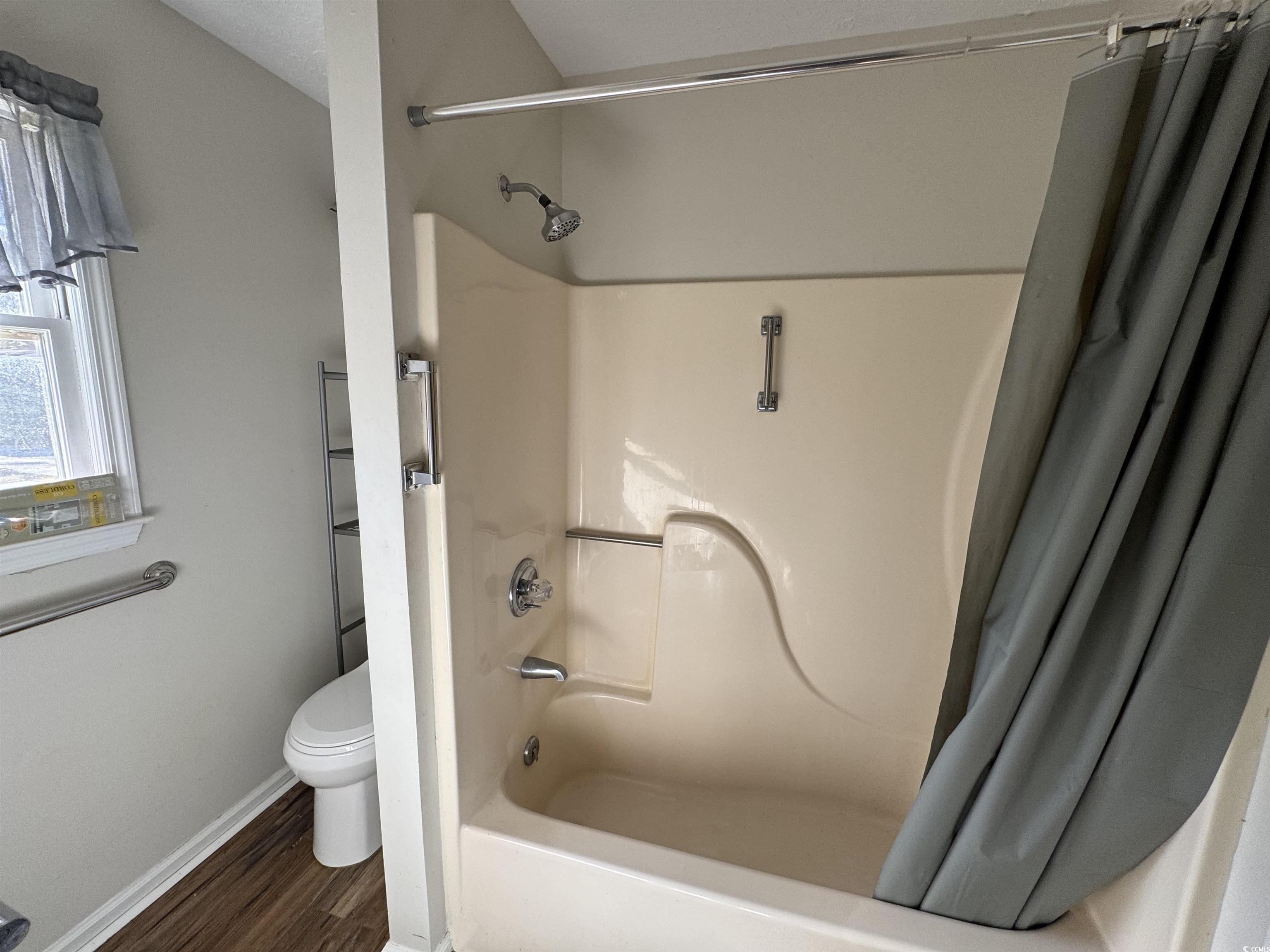 1014 Holt Road Conway, SC 29526 - Photo 8 of 23 Bathroom with hardwood / wood-style floors, toilet