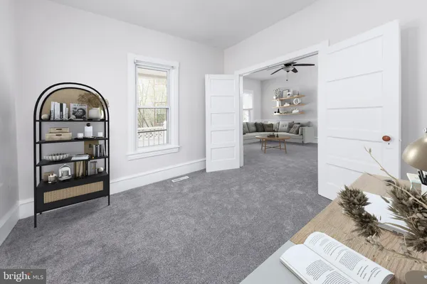 a view of livingroom with furniture and window