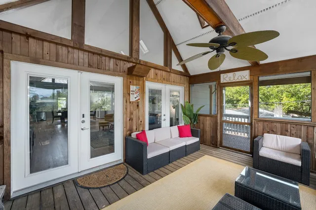a view of a patio with couches chairs and a table