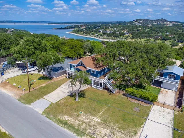 an aerial view of a house with a garden