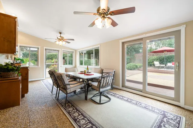 a view of swimming pool with a trees in the background