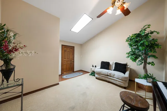 a kitchen with stainless steel appliances granite countertop a sink a stove and a microwave