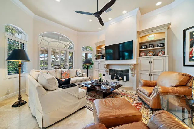 an aerial view of a residential houses with outdoor space