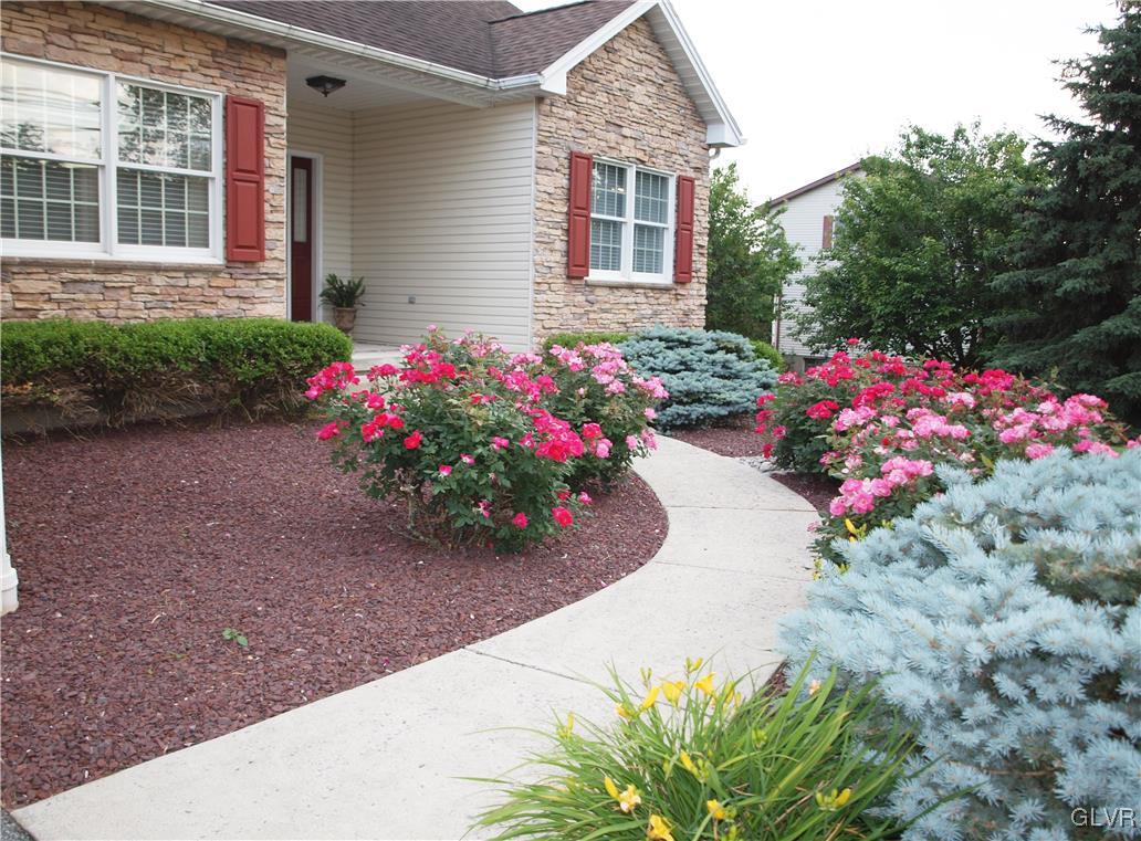4493 Steuben Road Bethlehem, PA 18020 - Photo 2 of 45 Colorful landscaping and fragrant rose bushes gree