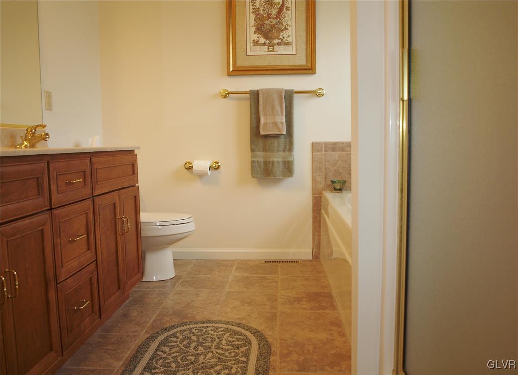4493 Steuben Road Bethlehem, PA 18020 - Photo 22 of 45 Master bath with tile floors and Stofanak cabinetr