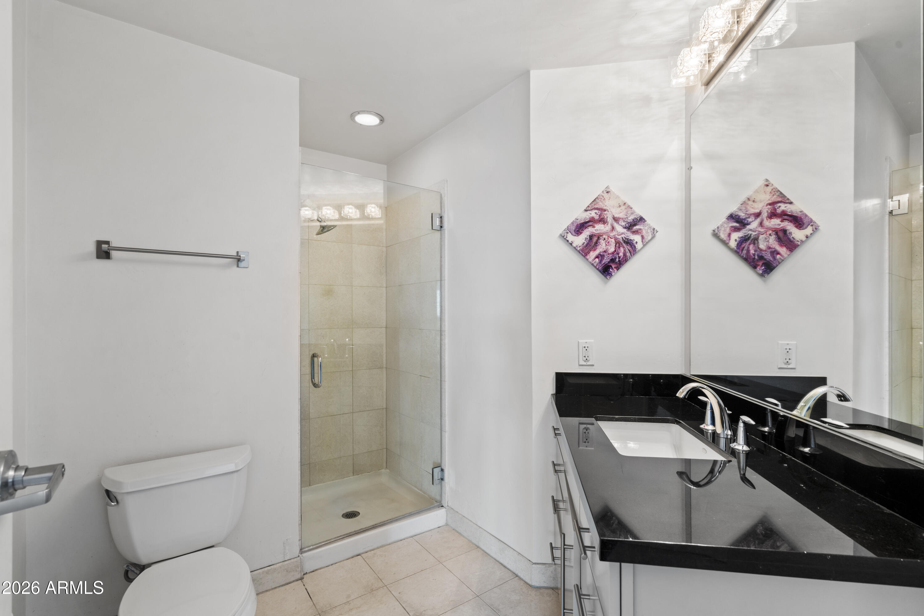 310 South 4th Street, Unit 601 Phoenix, AZ 85004 - Photo 12 of 29 a bathroom with a sink and a mirror