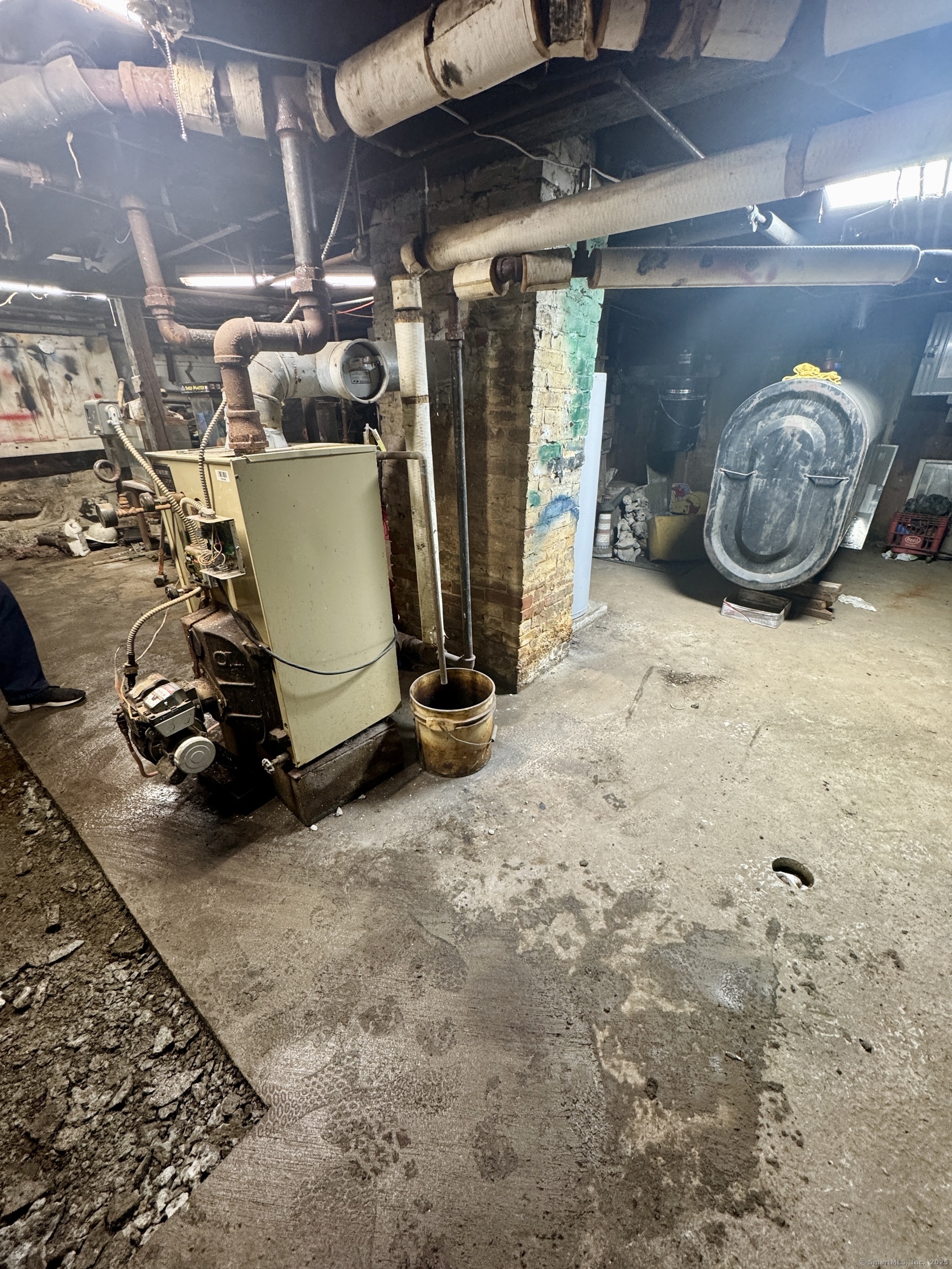 44-46 South Chestnut Street Plainfield, CT 06387 - Photo 35 of 40 a room with lots of storage and utility