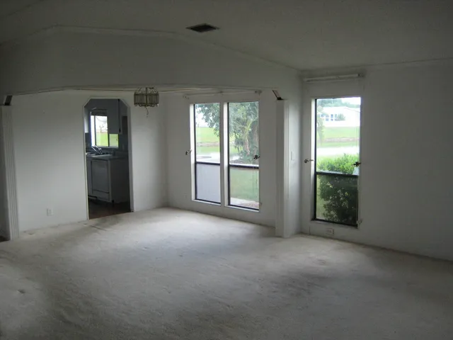 an empty room with windows