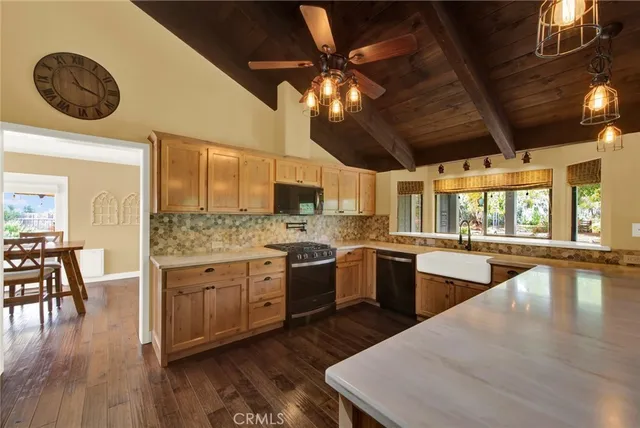 a view of a bathroom with a sink and a large window