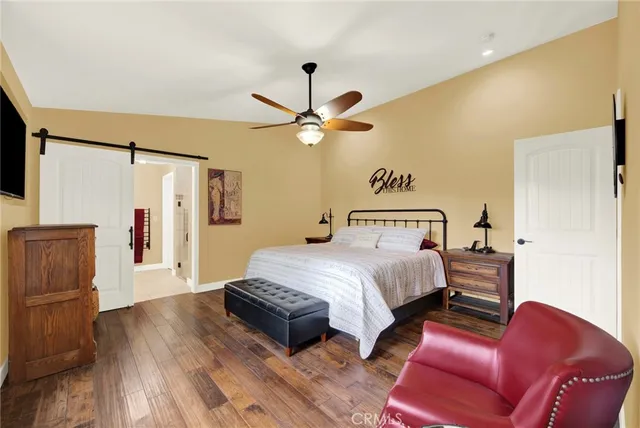 a view of a backyard of a house with a yard