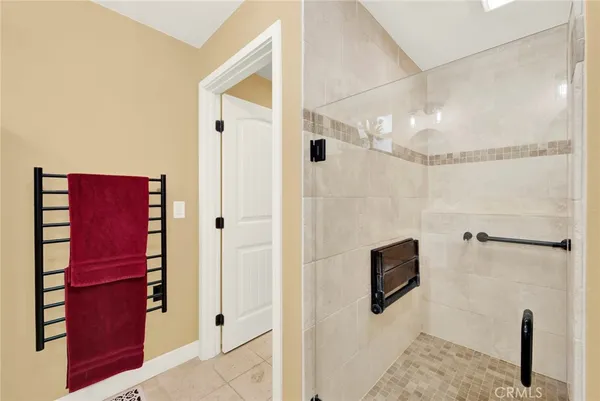 a view of a house with backyard porch and sitting area