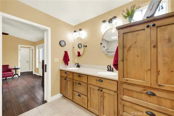 a view of a park with bench and a fire pit