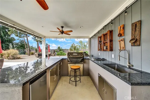 a view of a yard with entertaining space