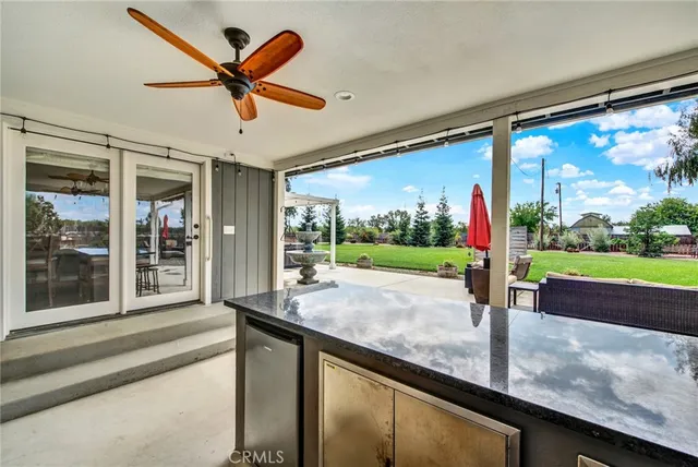 a view of a house with a outdoor space and parking
