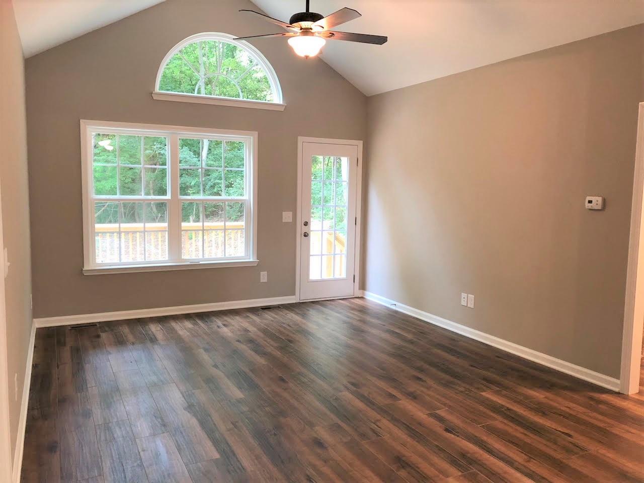 214 East 4th Avenue Springfield, TN 37172 - Photo 6 of 16 Vaulted ceiling in Living Room and tons of natural light