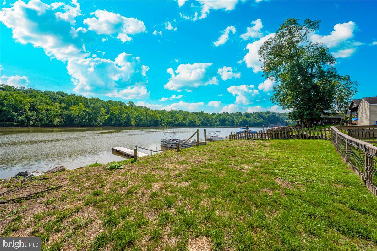 9 Boo Boo Boulevard Falling Waters, WV 25419 - Photo 14 of 40 a view of a lake with outdoor space