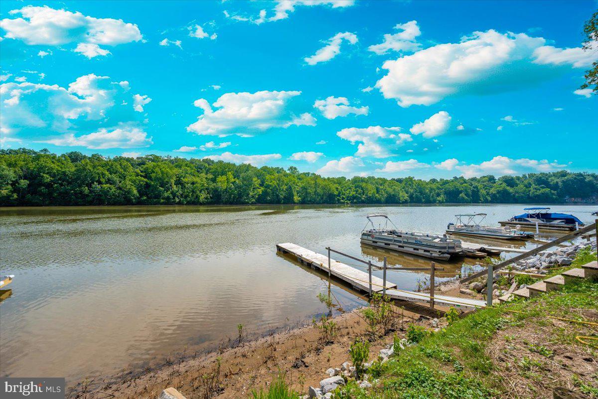 9 Boo Boo Boulevard Falling Waters, WV 25419 - Photo 15 of 40 a view of a lake with outdoor space