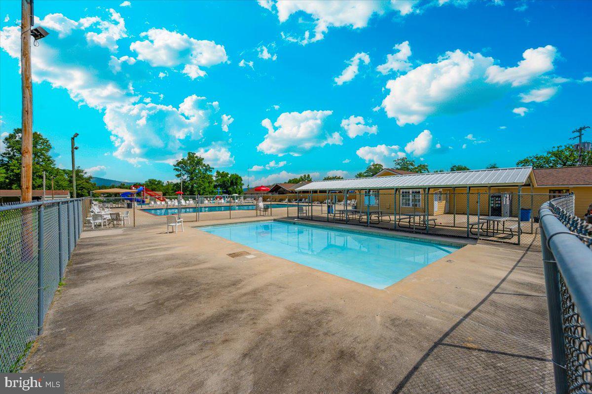 9 Boo Boo Boulevard Falling Waters, WV 25419 - Photo 23 of 40 a view of swimming pool with sitting area