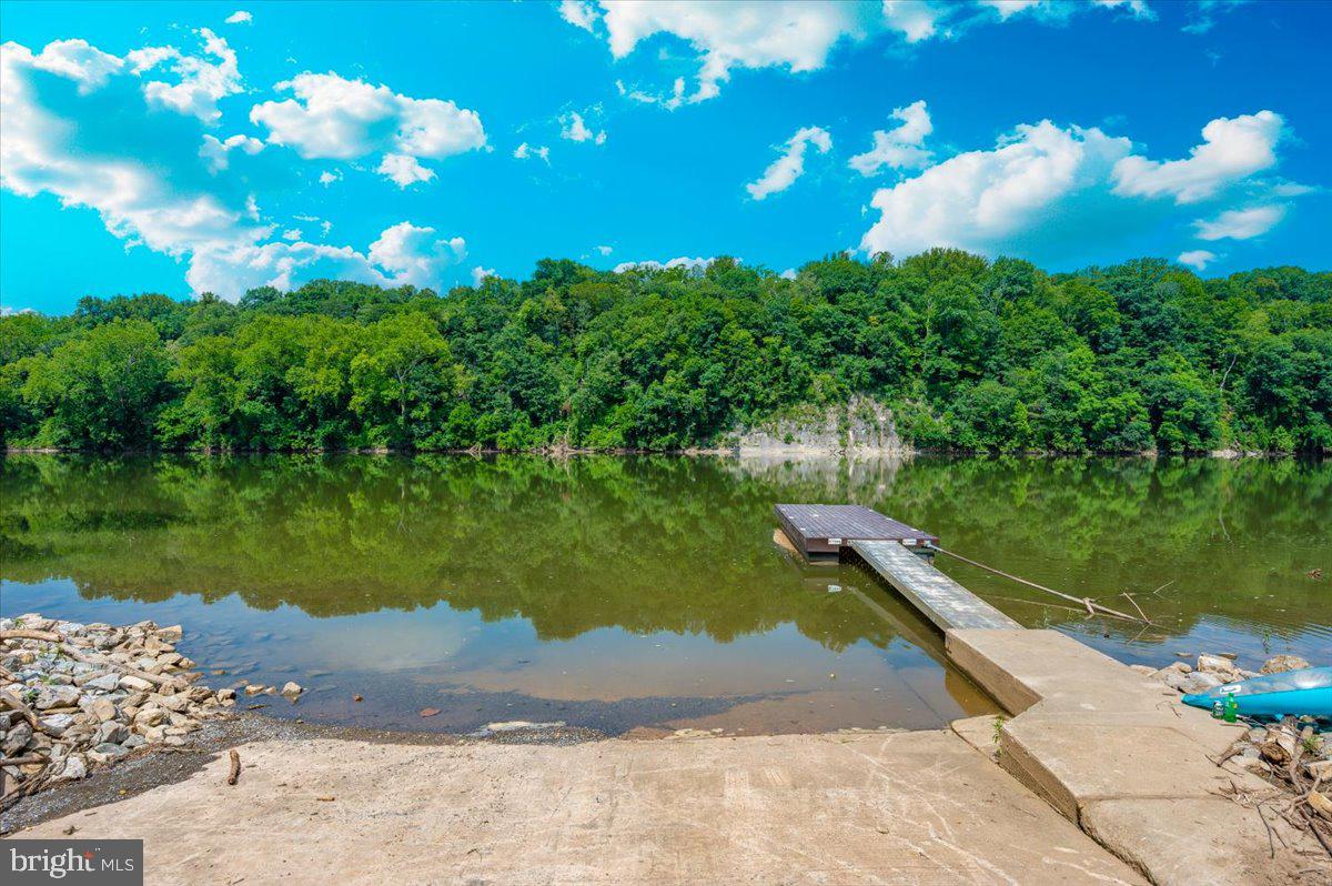 9 Boo Boo Boulevard Falling Waters, WV 25419 - Photo 35 of 40 a view of a lake with a yard