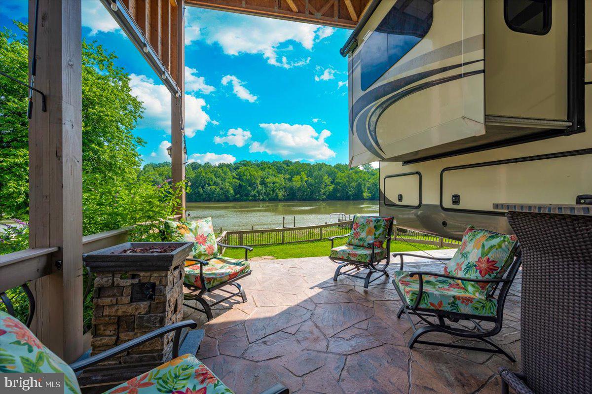 9 Boo Boo Boulevard Falling Waters, WV 25419 - Photo 10 of 40 a view of chairs and table in patio