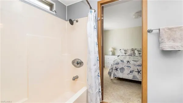 a bathroom with a sink and a shower