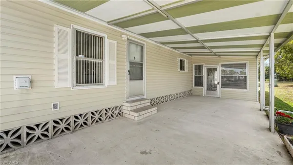 a view of a house with a street