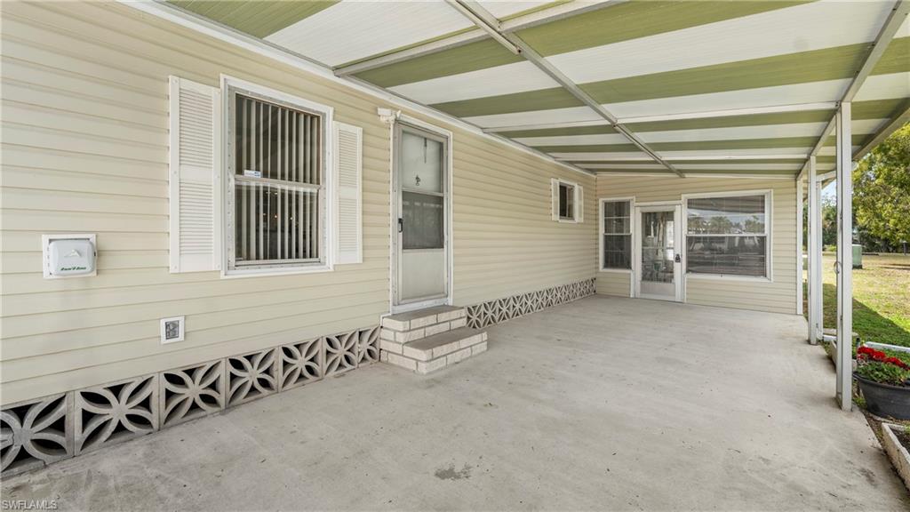 250 Indian Key Lane Naples, FL 34114 - Photo 26 of 33 a view of a house with a street