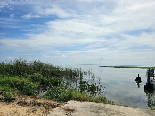 a view of a lake with a city view