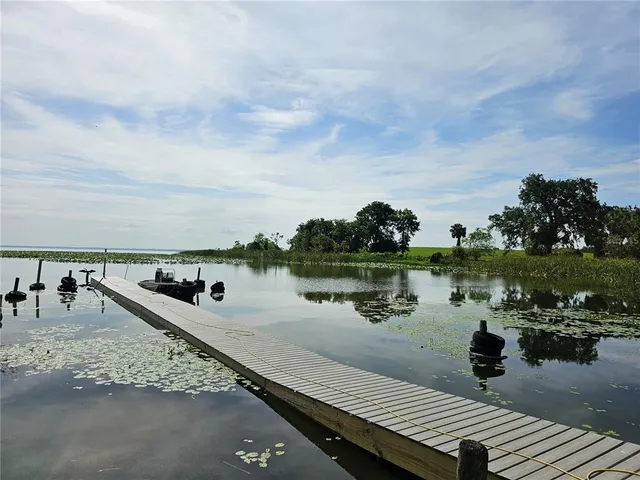a view of a lake and outdoor space