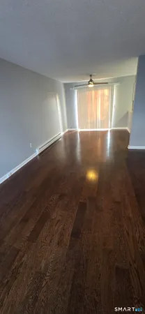 a view of balcony with furniture